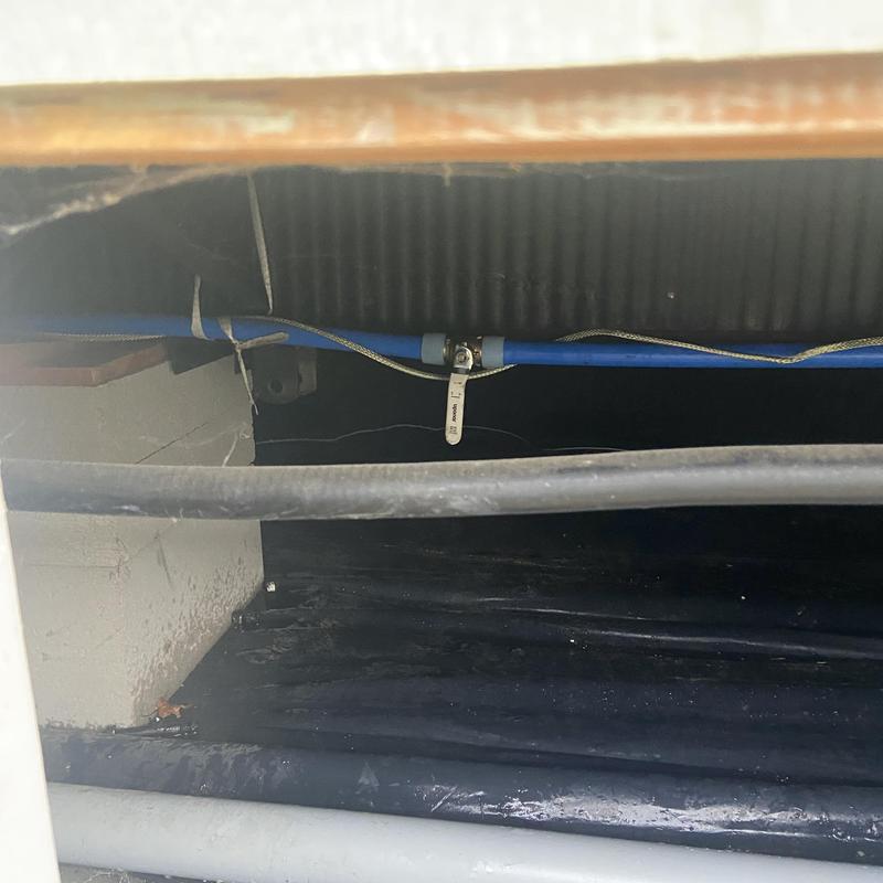 Main water shut off valve with leaking pipe and flooding