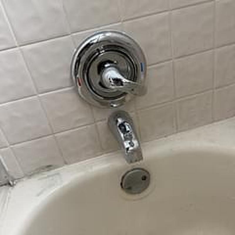 Shower valve with new arm and tub spout installed