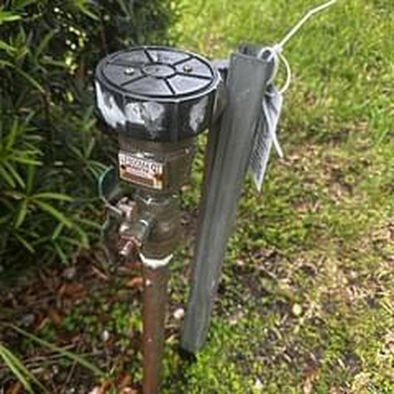 Watts PVB backflow preventer with test tag outdoors