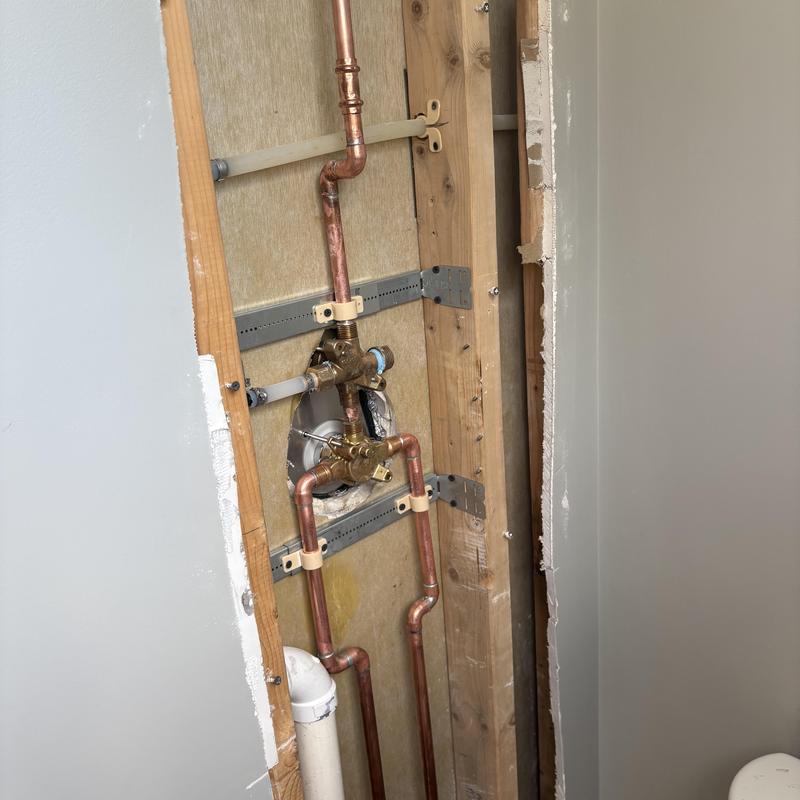 Moen Eco shower valve installation in bathroom wall cavity Moen Eco shower valve installation in bathroom wall cavity