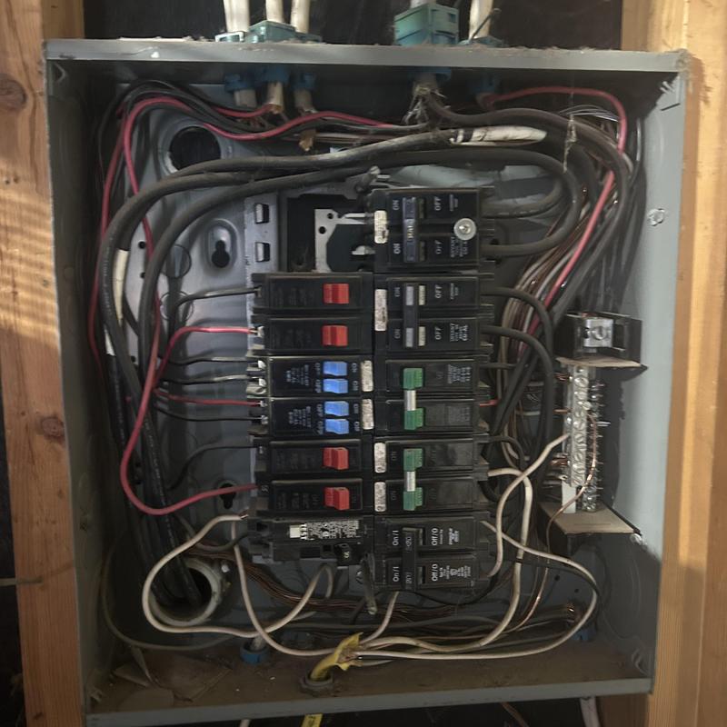 Main electrical service panel with circuit breakers