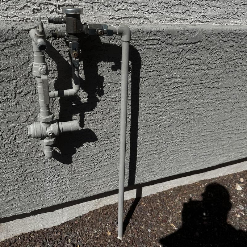 Outdoor hose bib and water line installation on wall Outdoor hose bib and water line installation on wall