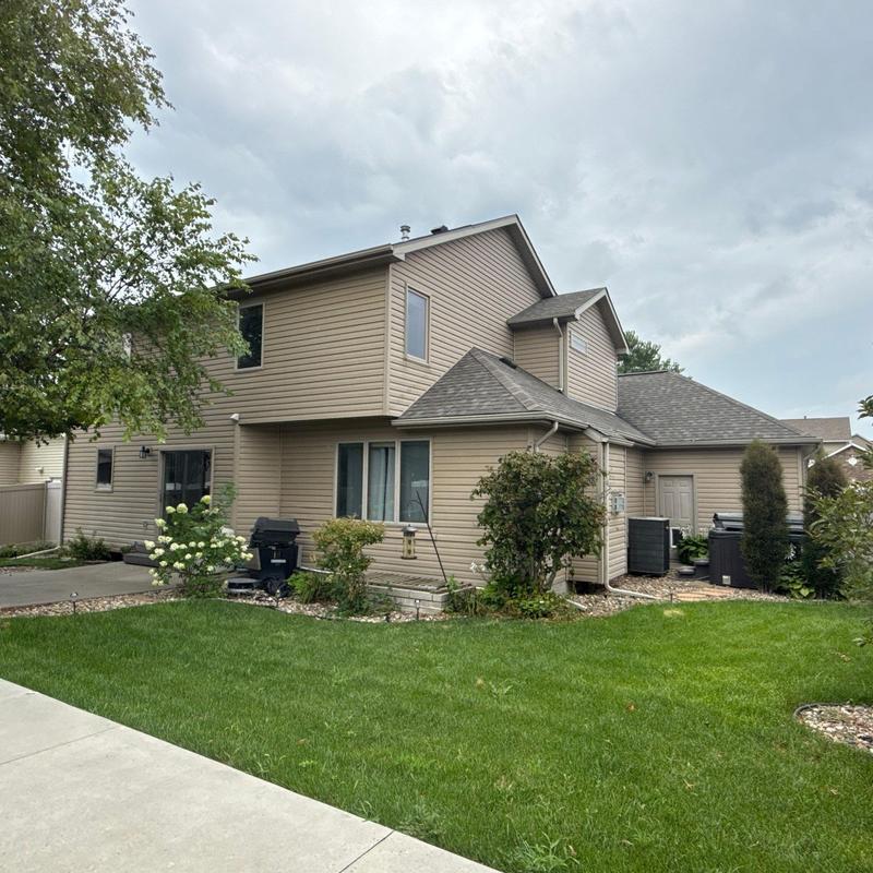 Tamko Titan XT impact resistant roof on suburban home Tamko Titan XT impact resistant roof on suburban home