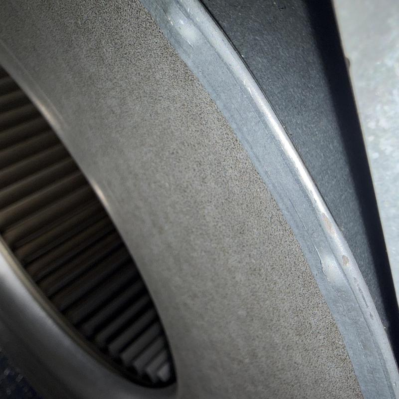 AC blower wheel close-up showing metal blades and housing AC blower wheel close-up showing metal blades and housing