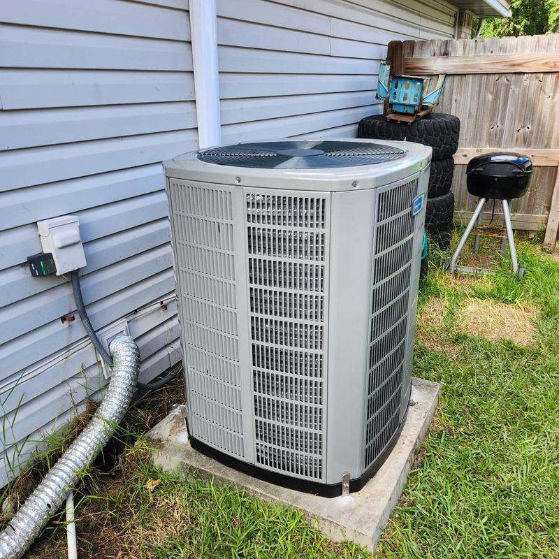 3.5 ton 14 SEER2 AC unit installed outside home 3.5 ton 14 SEER2 AC unit installed outside home