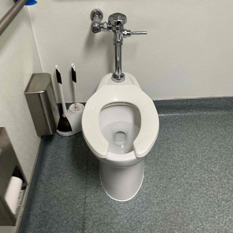 American Standard commercial toilet with Sloan flush valve