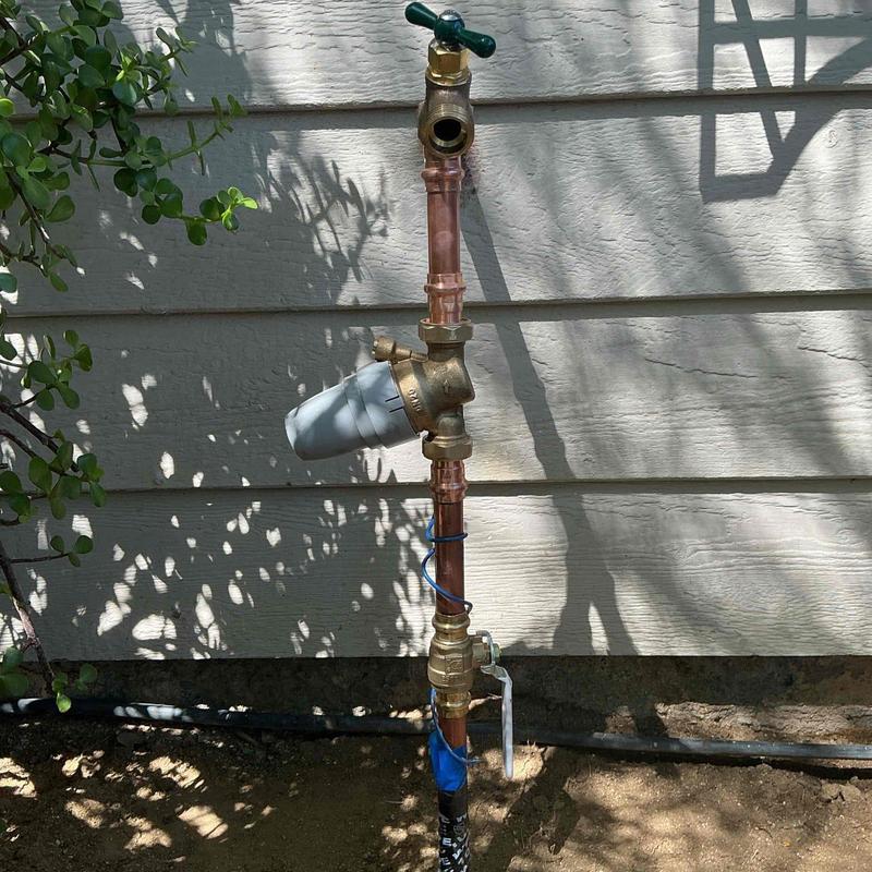 34-inch ball valves and pressure regulator installation outdoors