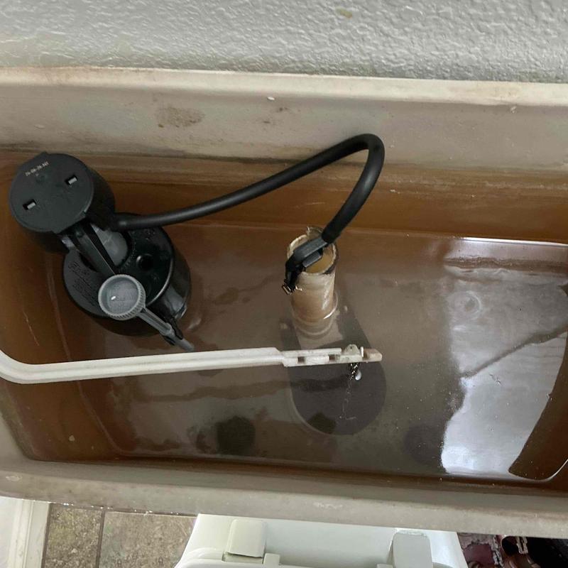 Toilet fill valve inside tank with water level