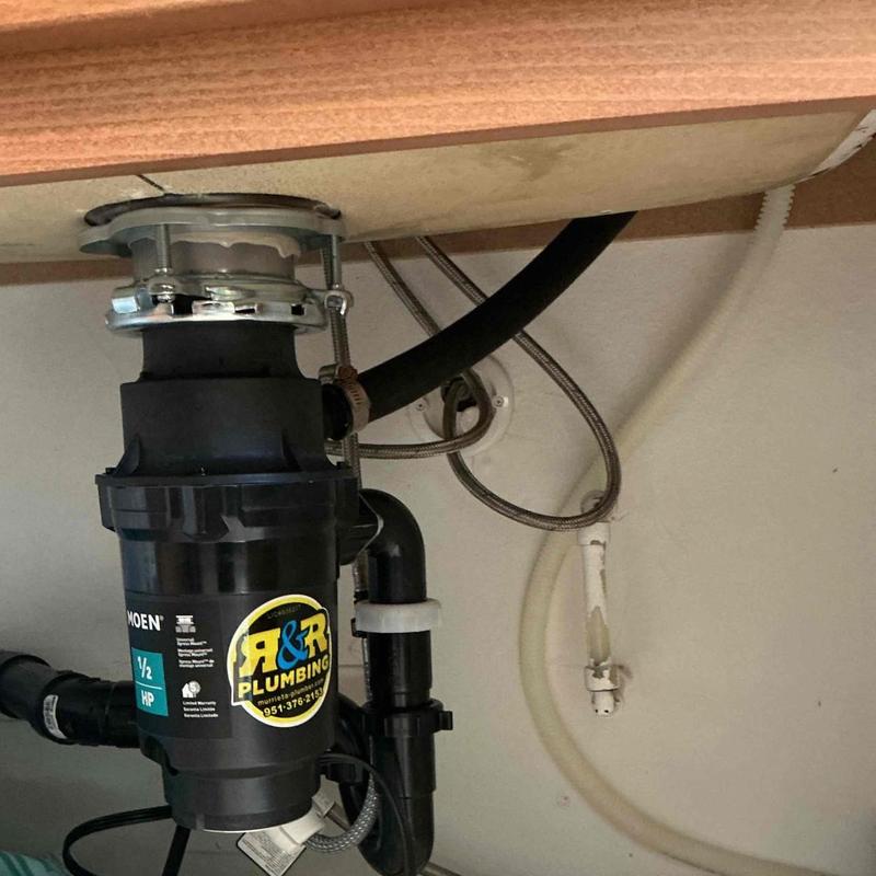 Garbage disposal unit installation under sink