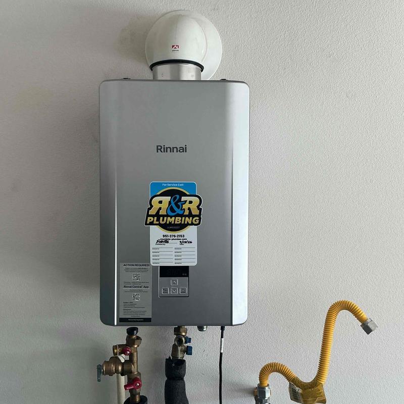 Tankless water heater with new plumbing connections