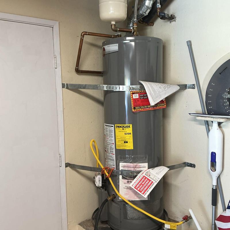 Storage tank water heater with plumbing connections