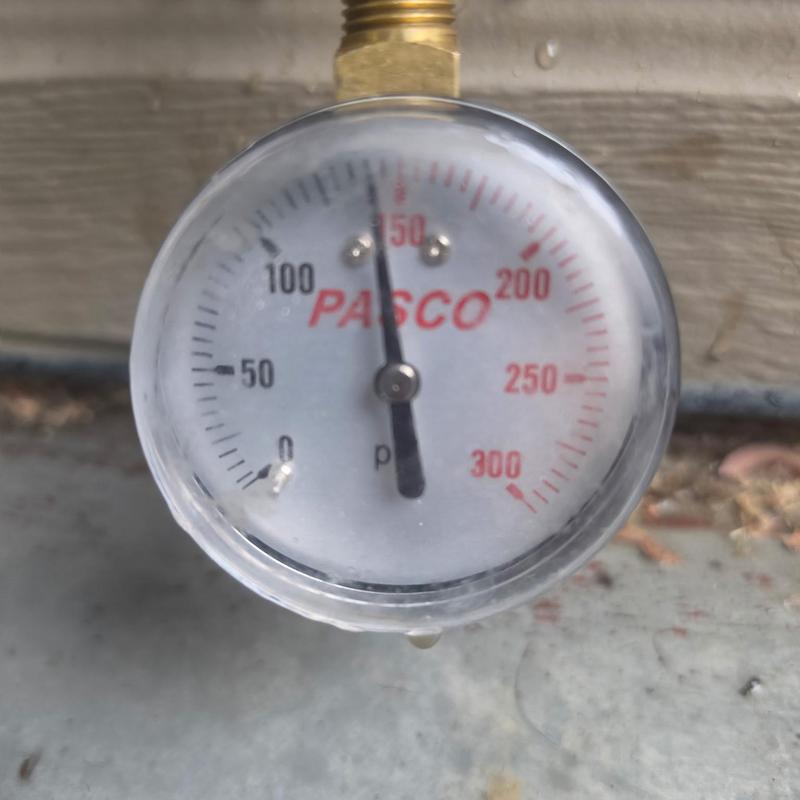 Pressure gauge on plumbing system showing high pressure Pressure gauge on plumbing system showing high pressure