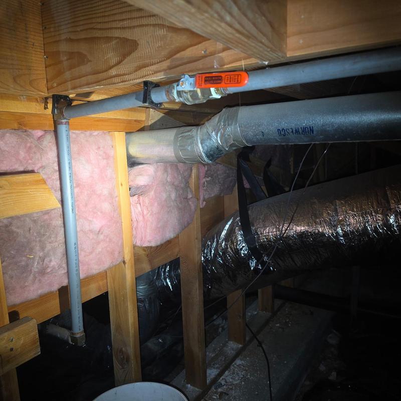 Pressure reducing valve installed on PEX piping in crawlspace Pressure reducing valve installed on PEX piping in crawlspace