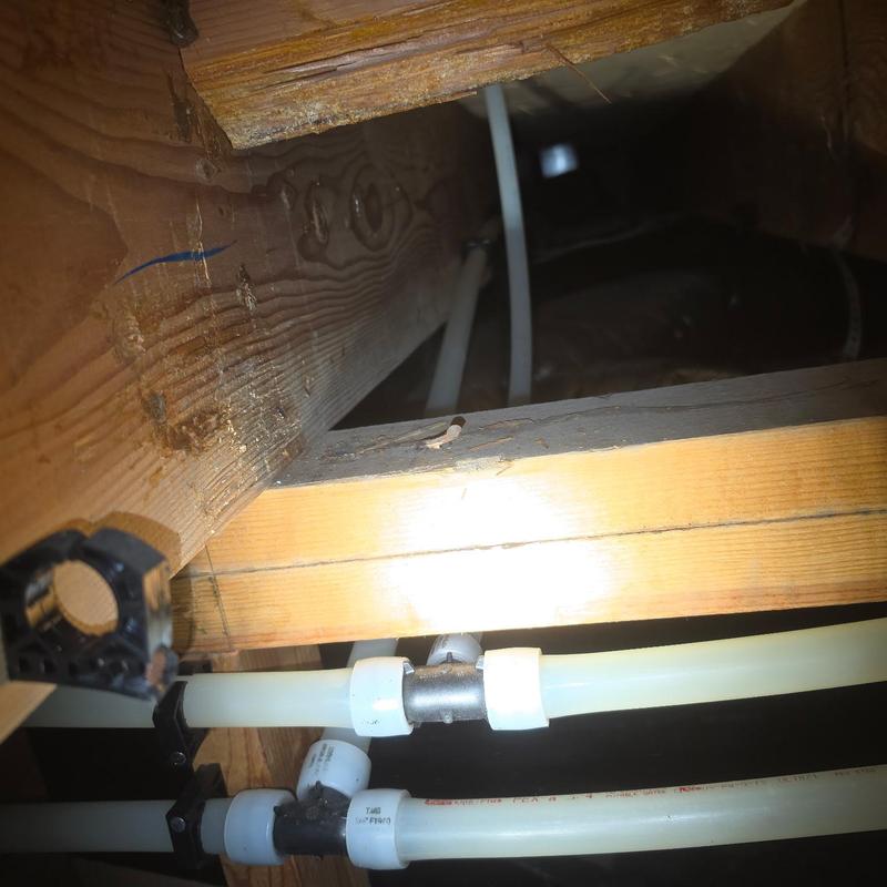 Pex piping re-pipe in crawlspace with fittings Pex piping re-pipe in crawlspace with fittings