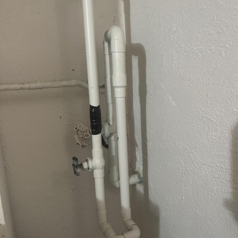 Basement PVC piping with valve and taped joint Basement PVC piping with valve and taped joint