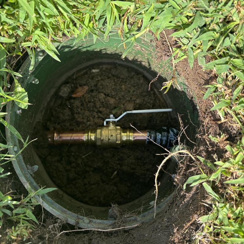 Main irrigation shut-off valve with handle in ground Main irrigation shut-off valve with handle in ground