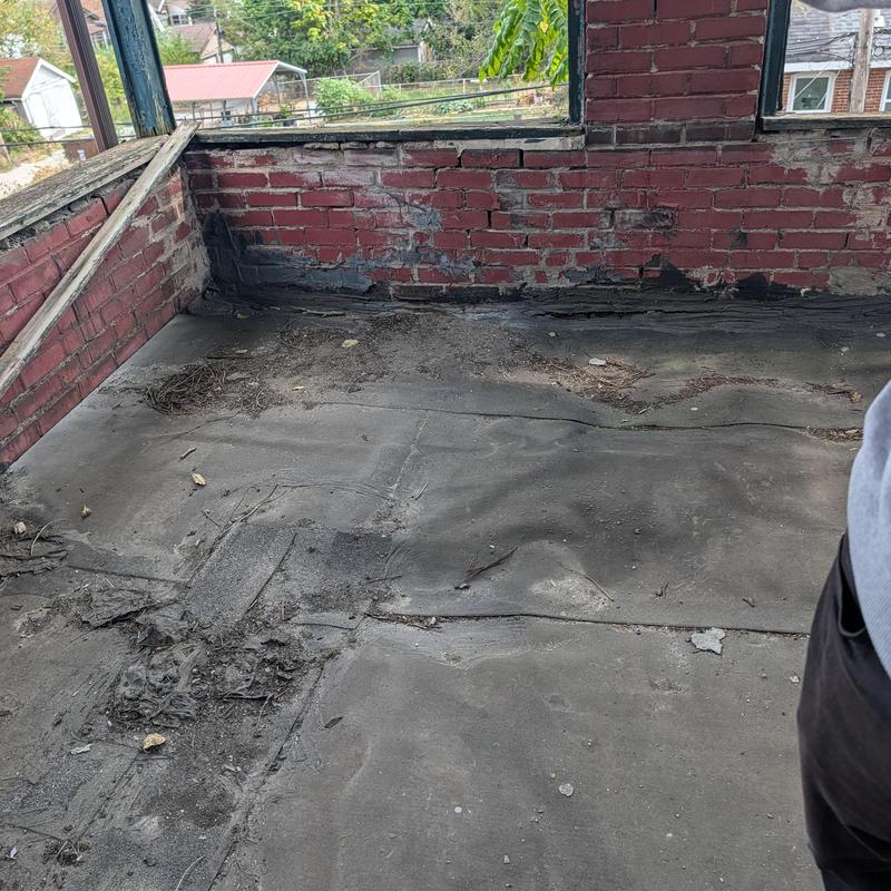 Modified bitumen roof deck with rotten floor and joists