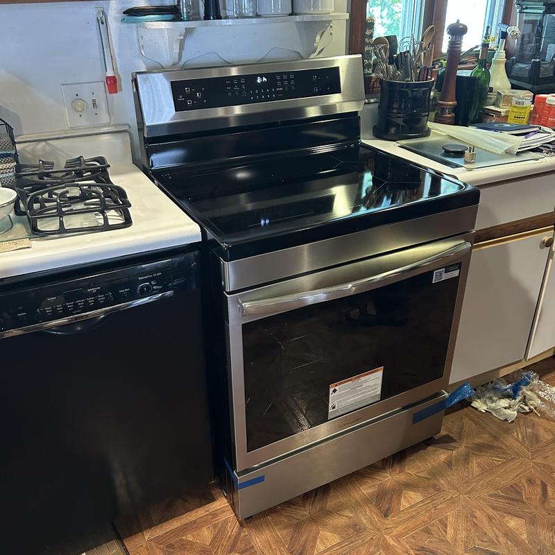 Electric oven installation replacing gas unit in kitchen Electric oven installation replacing gas unit in kitchen