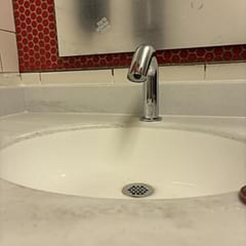 Commercial bathroom sink faucet and countertop replacement