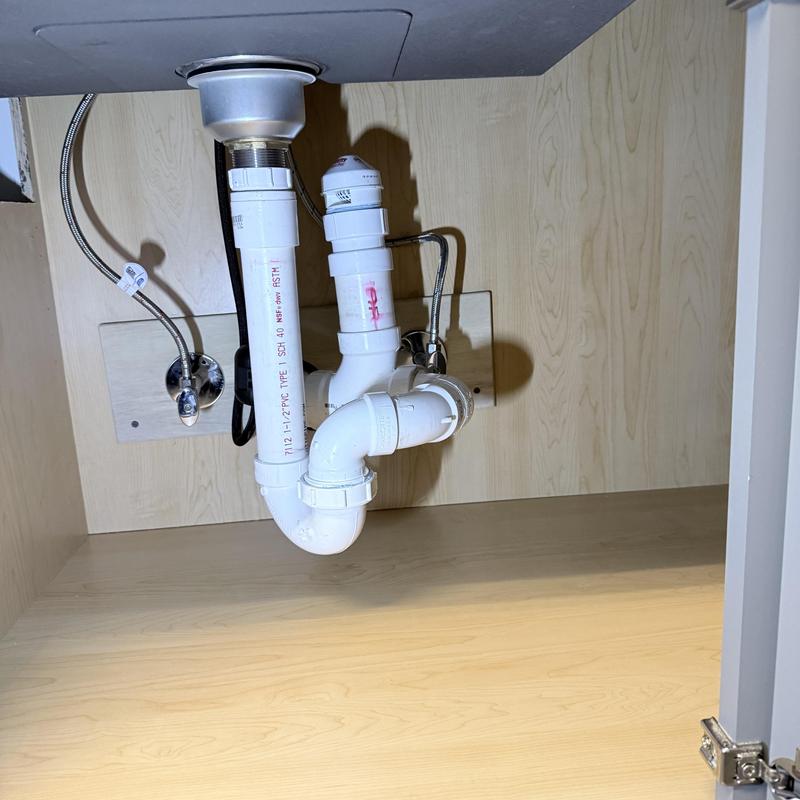 PVC sink drain pipes under kitchen cabinet installation PVC sink drain pipes under kitchen cabinet installation