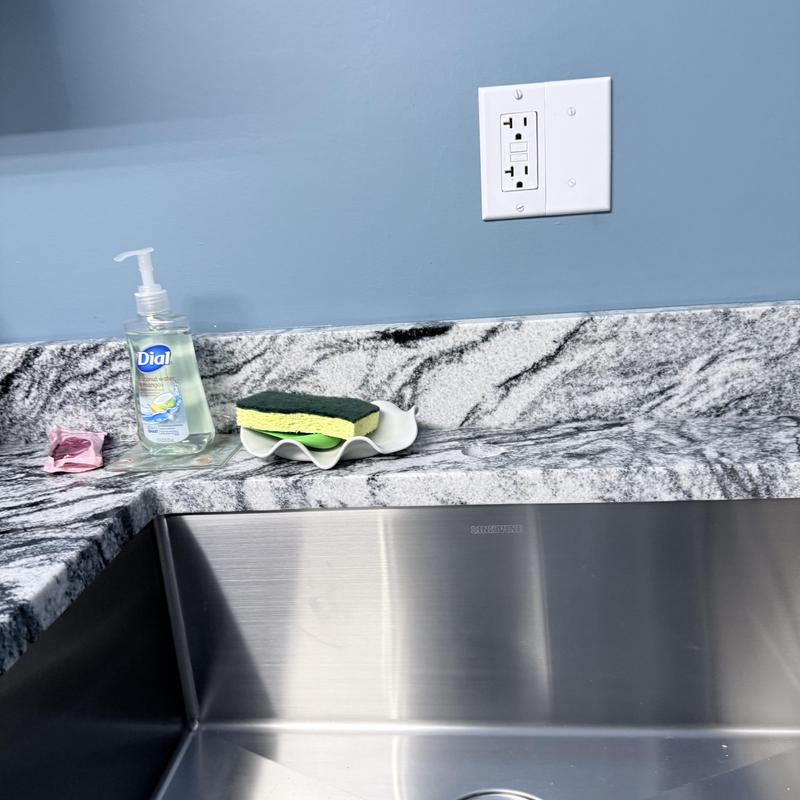 Stainless steel kitchen sink with granite countertop Stainless steel kitchen sink with granite countertop