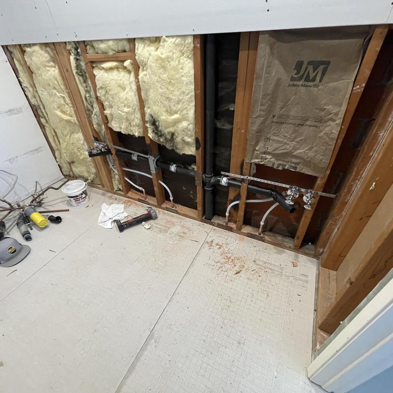 ABS drain piping reroute inside wall studs
