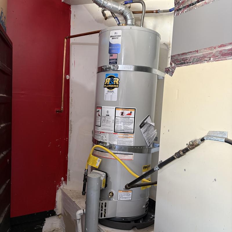 Bradford White water heater with plumbing connections