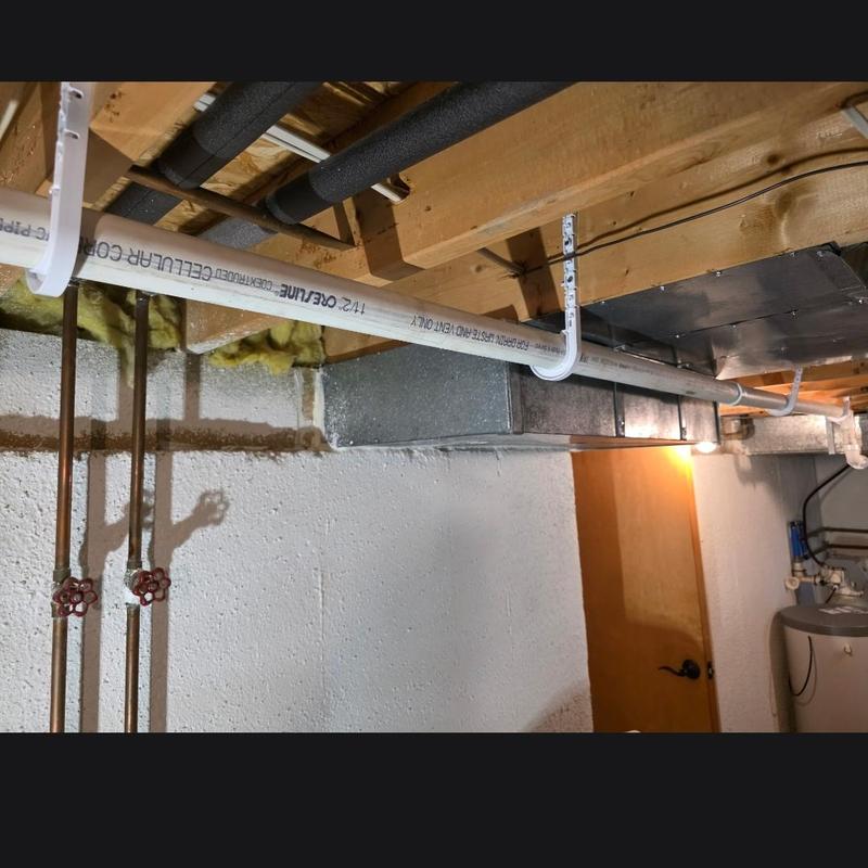 PVC drain pipe installation in basement ceiling PVC drain pipe installation in basement ceiling