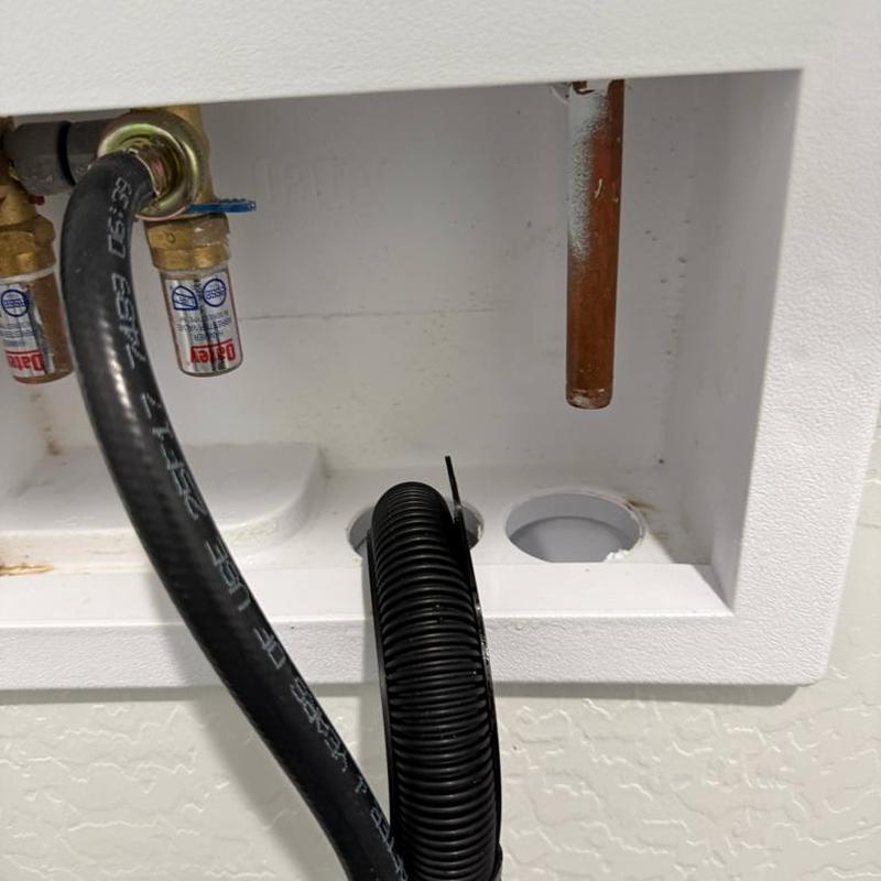 Water softener drain line installation with adapters