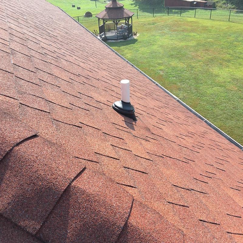 Roof vent pipe with new collar and repaired shingles Roof vent pipe with new collar and repaired shingles