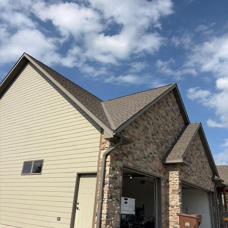 GAF Timberline shingles on stone exterior roof GAF Timberline shingles on stone exterior roof