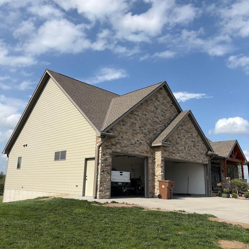 GAF Timberline HDZ roof with stone facade in Malcolm, NE GAF Timberline HDZ roof with stone facade in Malcolm, NE