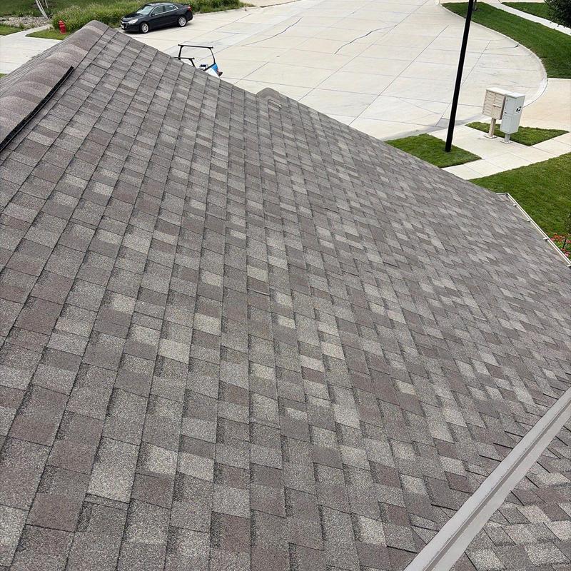 Tamko Titan XT asphalt shingles on residential roof Tamko Titan XT asphalt shingles on residential roof