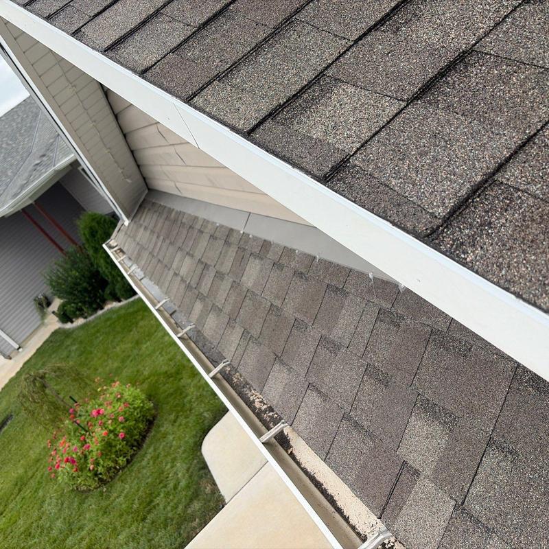 Gutter system replacement on residential roof in Lincoln, NE Gutter system replacement on residential roof in Lincoln, NE