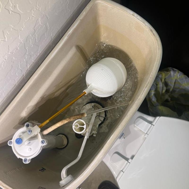 Toilet fill valve and float installation in tank
