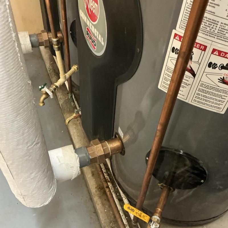 Commercial water heater with corrosion repairs and valves Commercial water heater with corrosion repairs and valves
