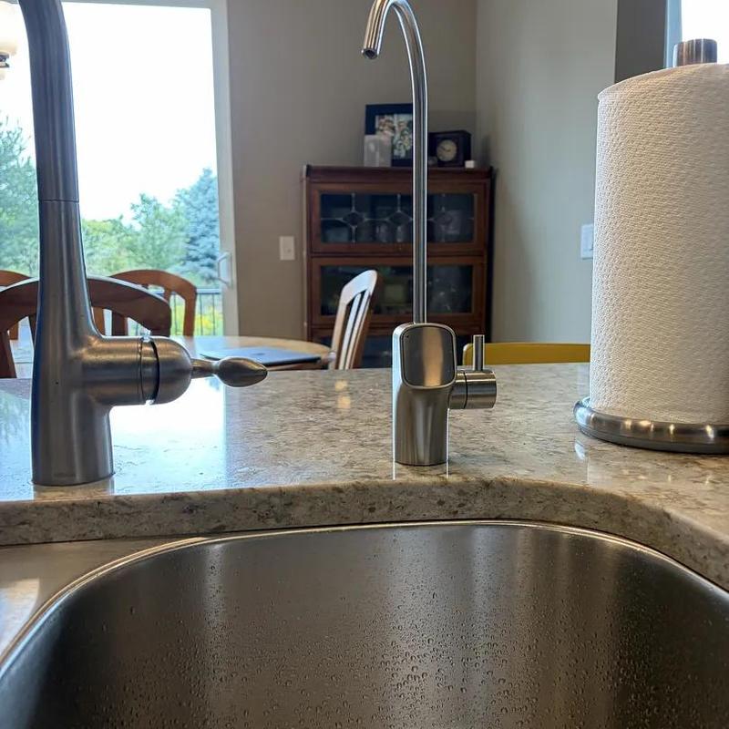 RO system faucet installed on kitchen sink countertop