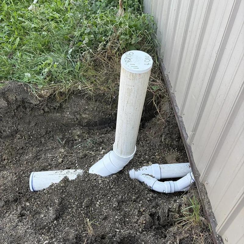 Underground PVC plumbing pipes for shop bathroom installation