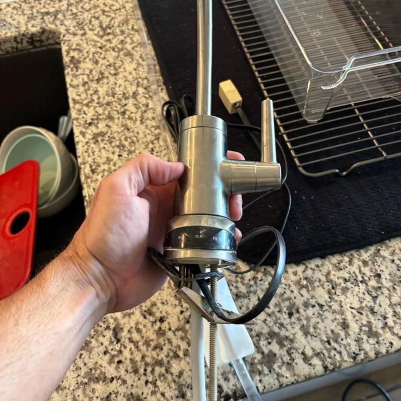 RO faucet with electrical wiring removed from sink