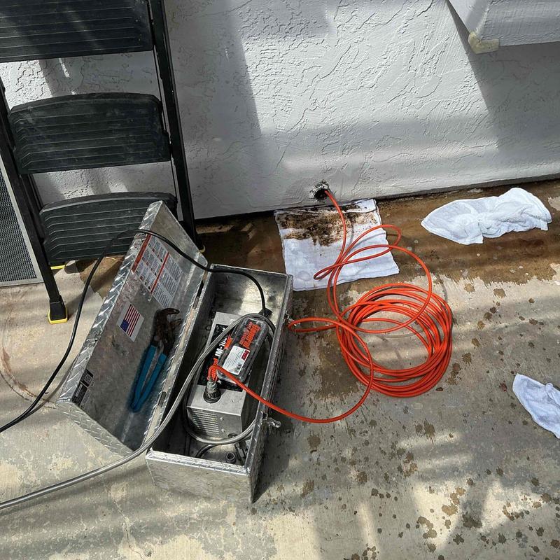 Kitchen sink drain mini hydro-jetter cleaning setup