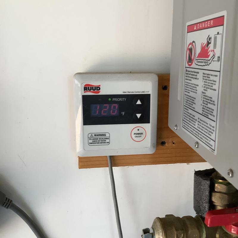 Ruud tankless water heater control panel in garage Ruud tankless water heater control panel in garage