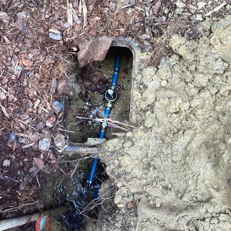 PEX water pipe leak repair in flower bed excavation PEX water pipe leak repair in flower bed excavation