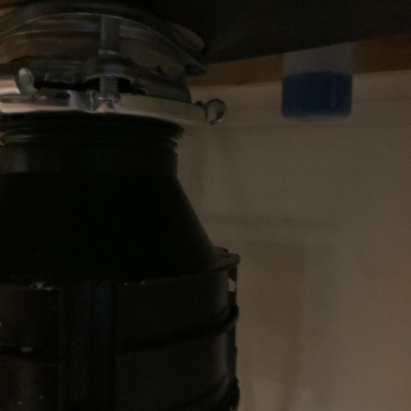 Garbage disposal unit under kitchen sink installation Garbage disposal unit under kitchen sink installation