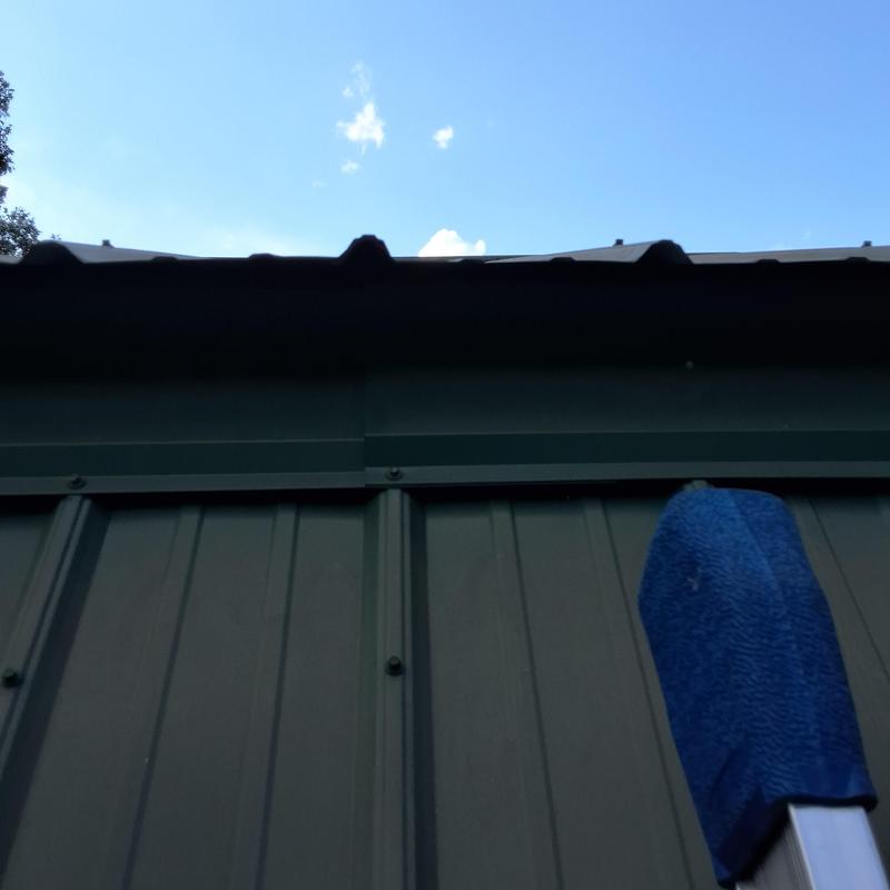 Metal roof trim removal with ladder in Blountville, TN Metal roof trim removal with ladder in Blountville, TN