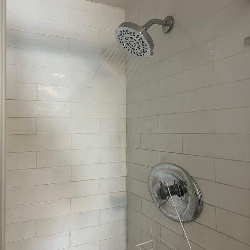 Delta multi-function showerhead installed with water flow