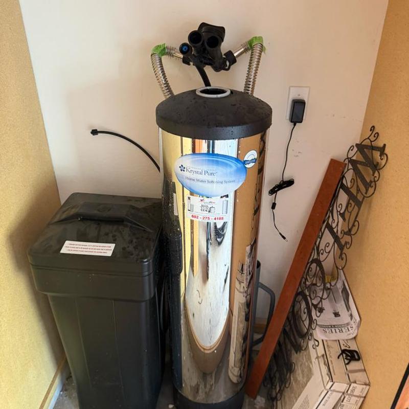 Water softener tank and brine tank installation indoors
