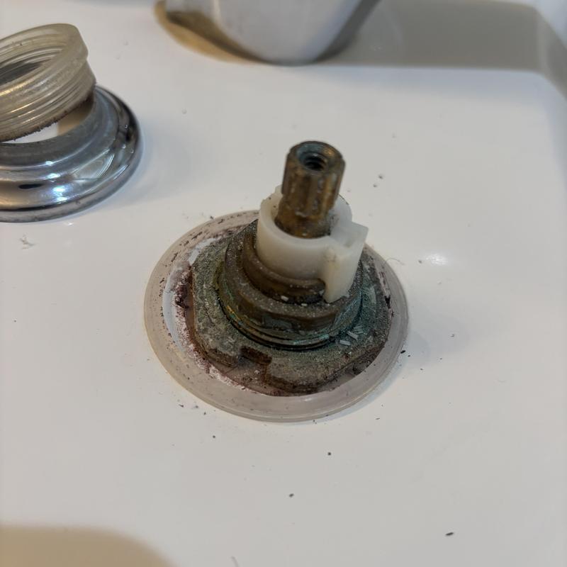 Roman tub faucet ceramic stem with corrosion buildup Roman tub faucet ceramic stem with corrosion buildup
