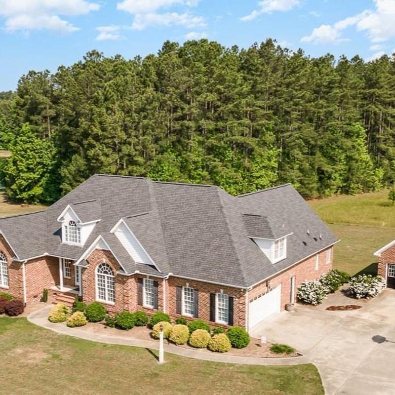 Architectural shingle roofing on brick home in Raleigh, NC Architectural shingle roofing on brick home in Raleigh, NC