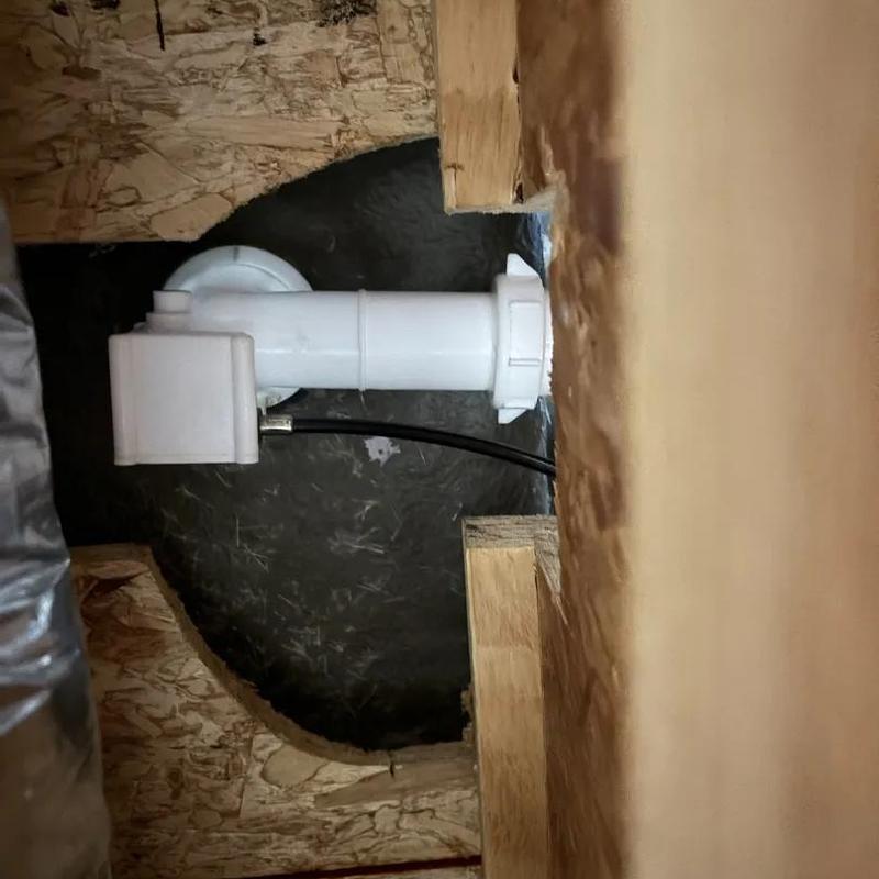 Tub drain assembly with connected wiring in wall cavity