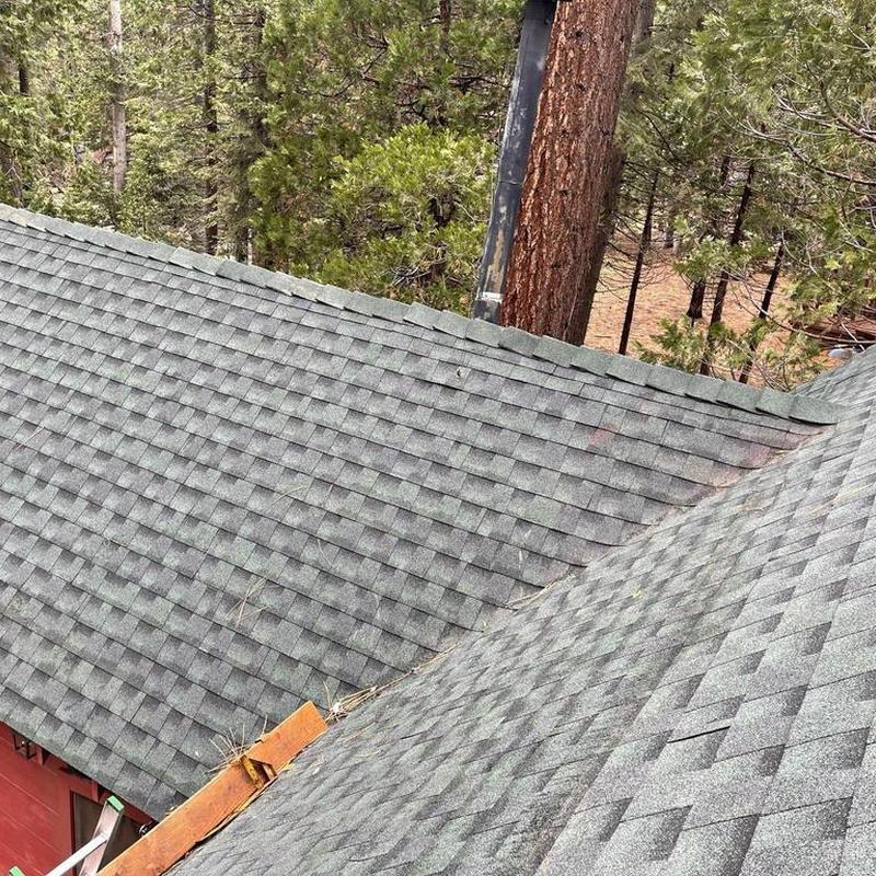 Gaf asphalt roof shingles on cabin rooftop Gaf asphalt roof shingles on cabin rooftop